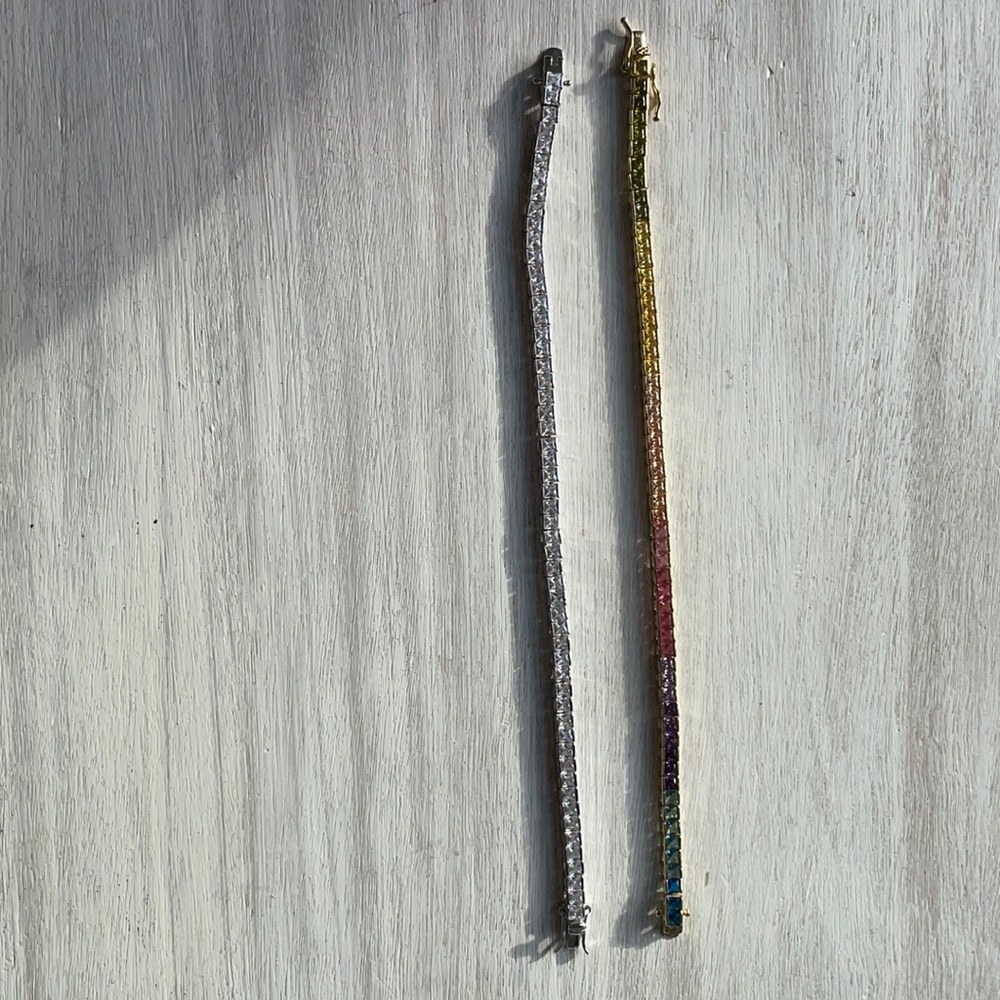 Two tennis bracelets- one rainbow and one classic